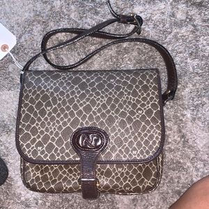 Nina Ricci vintage crossbody leather canvas, 16 inch drops adjustable strap